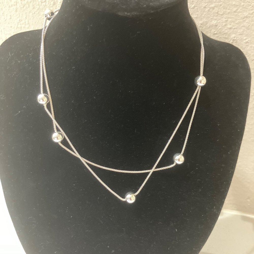 Long single strand Silver necklace with small silver beads